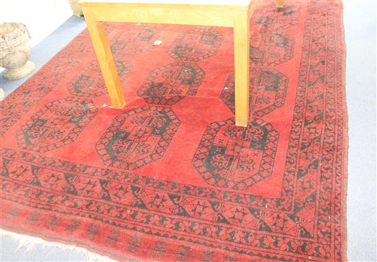 A North West Persian red ground carpet, 12ft 3in by 7ft 9in.